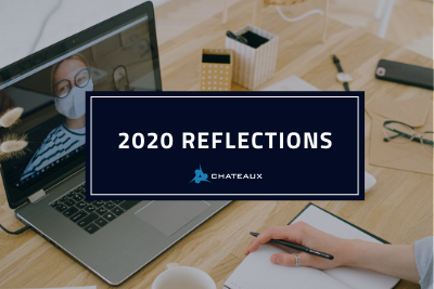 2020 Reflections from Chateaux - Worker at laptop with woman in facemask - 2020